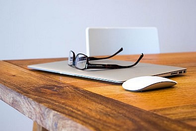 MacBook, mouse and glasses